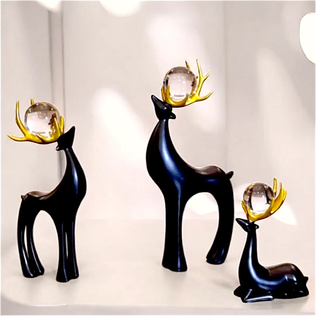 Deer figurine set of 3 on white console